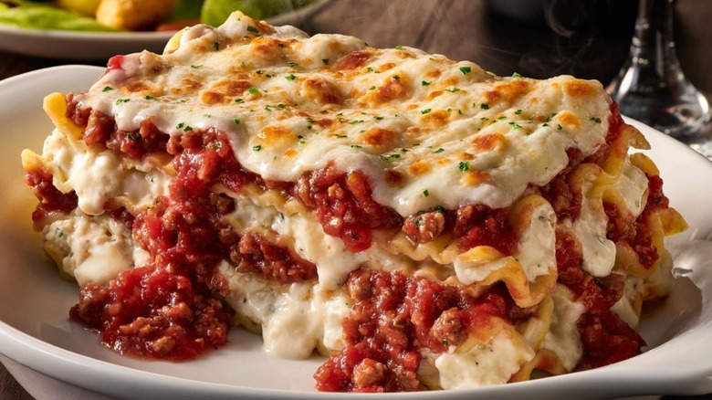 Slice of Olive Garden Lasagna Classico on a white plate