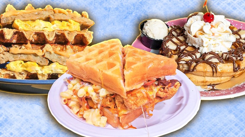 Three plates with unique waffle creations, including an egg sandwich, chicken and macaroni and cheese, and bananas, chocolate drizzle, and whipped cream