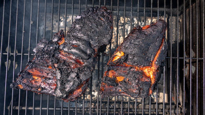Burnt ribs on a grill