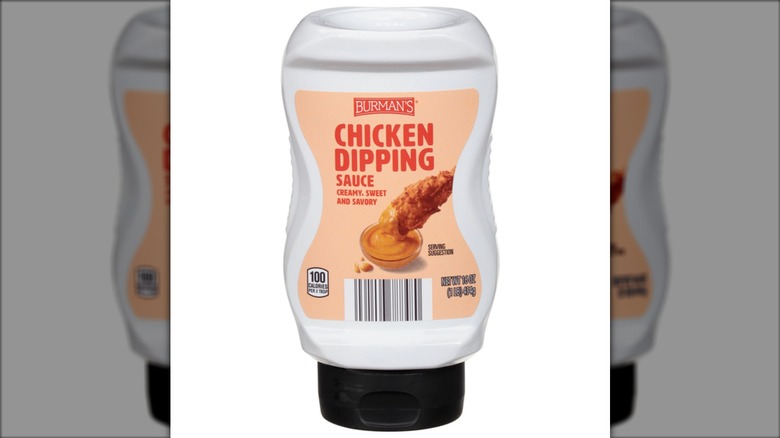 A bottle of Burman's Chicken Dipping Sauce on a white background.