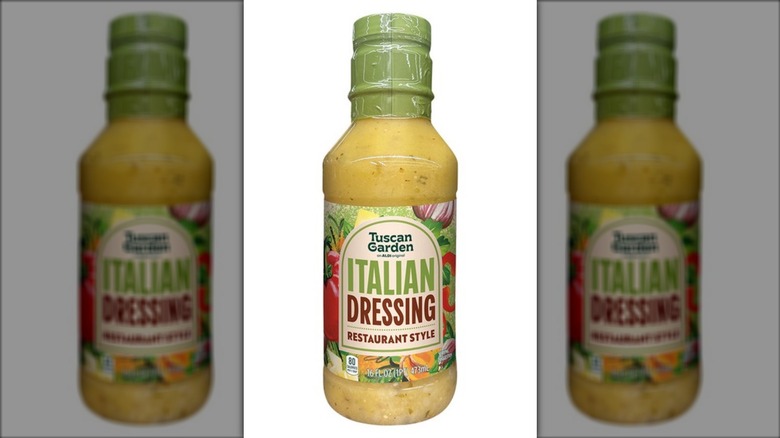 A bottle of Tuscan Garden Restaurant Style Italian Salad Dressing on a white background.