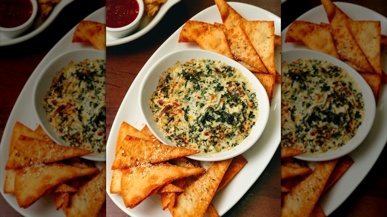 An appetizer of spinach artichoke dip at Olive Garden, mirrored