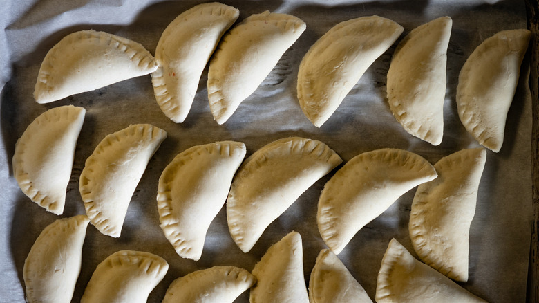 A tray of frozen pierogi