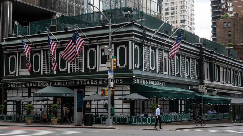 Smith & Wollensky storefront with American flags