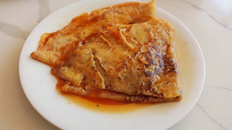 Crêpes suzette on a white plate