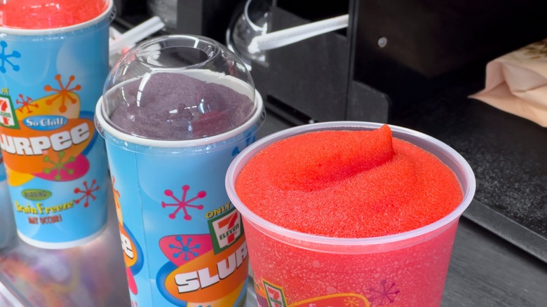Several Slurpee drinks at a 7-Eleven store