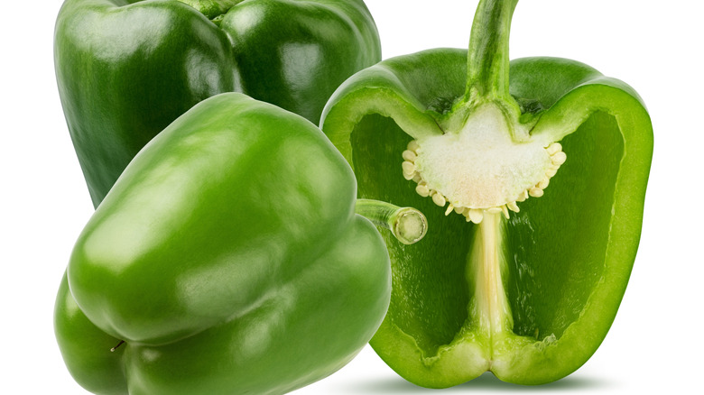 A close-up of green bell peppers