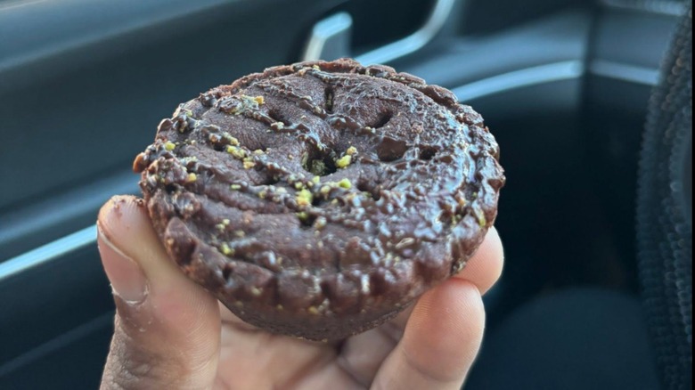 Starbucks Dubious Dubai Chocolate Bite held in a hand