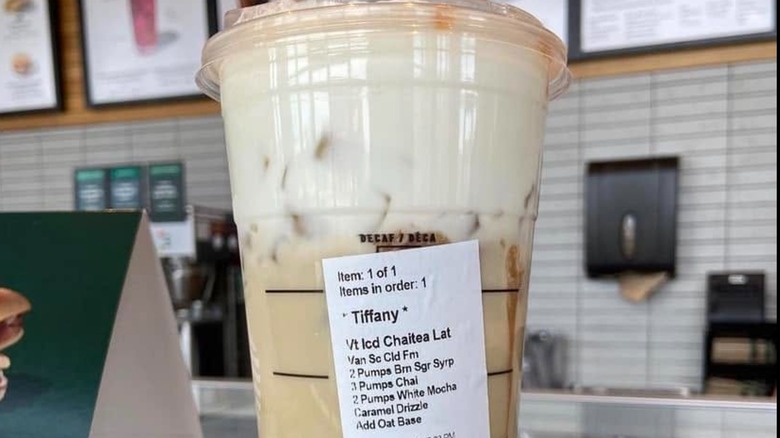 Customized Starbucks drink with printed tag instructions for many special syrup pumps and drizzles modifications