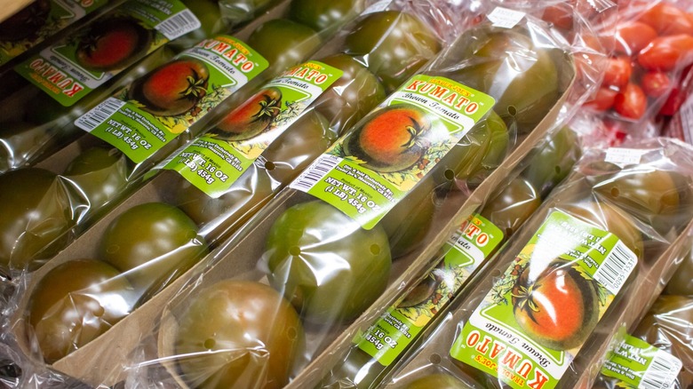 A view of several packages of Kumato tomatoes, at Trader Joe's