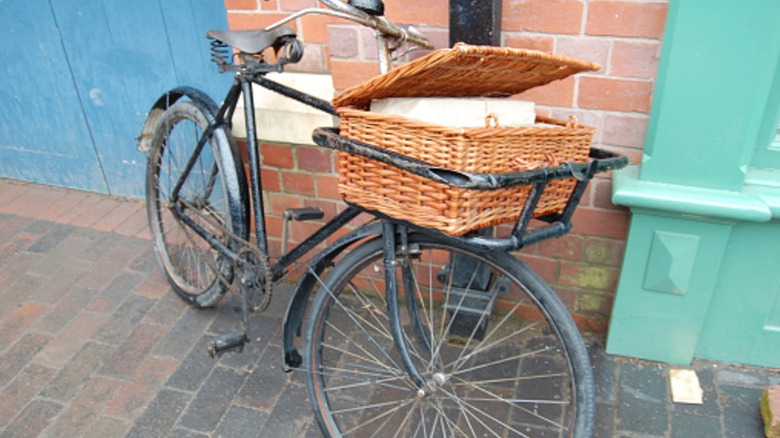 old fashioned delivery bicycle with basket