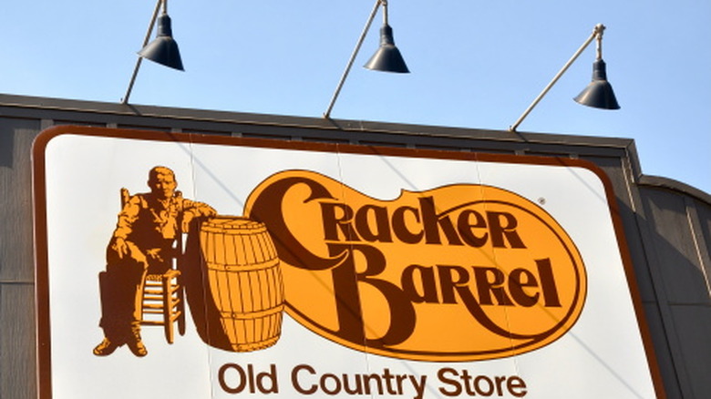 Cracker barrel original logo against a building front