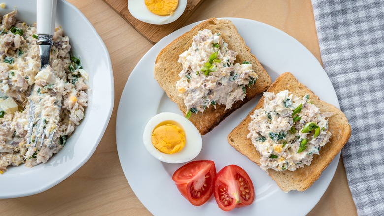 Toast with whitefish salad, eggs, and tomatoes