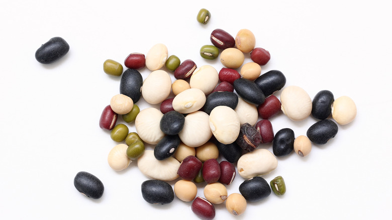 A mix of dried beans on a white background