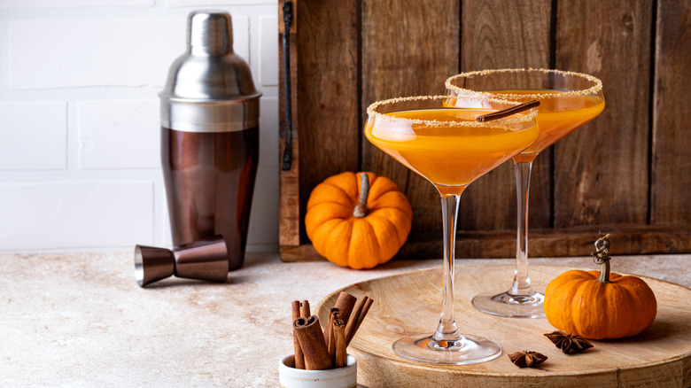 Homemade festive seasonal drink pumpkintini with cinnamon