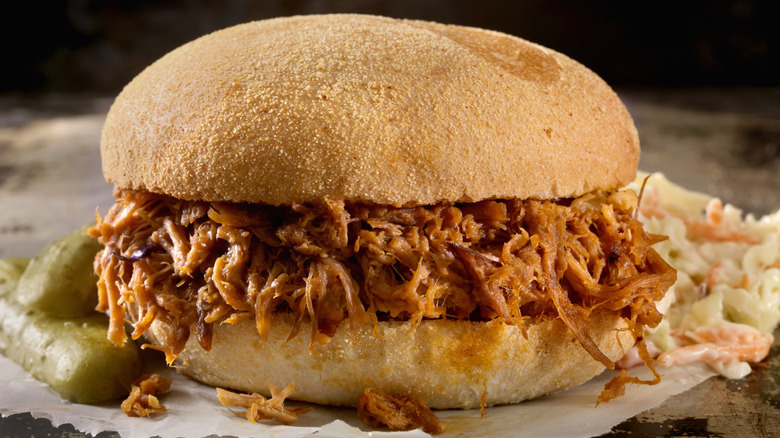 Pulled pork sandwich in BBQ sauce with coleslaw