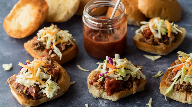 Delicious toasted pulled pork sliders with homemade barbecue sauce