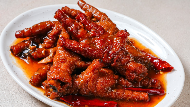 Close-up of a prepared dish of spicy chicken feet