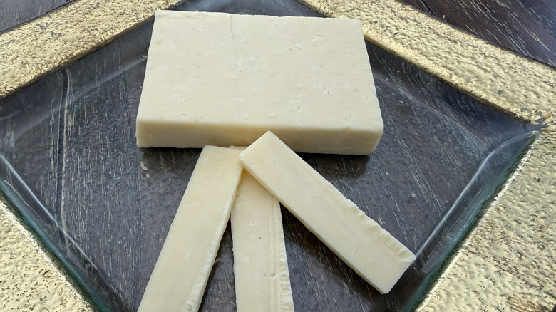 Trader Joe's Cheddar and Gruyère Melange cheese on gold rimmed plate