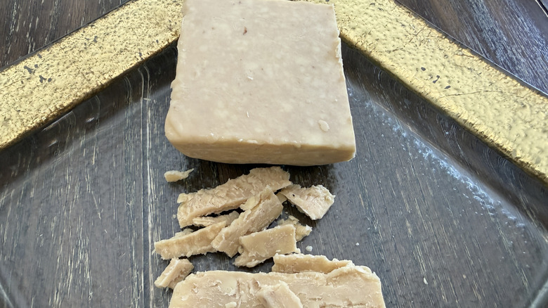 Trader Joe's English Cheddar with Caramelized Onions on gold rimmed plate