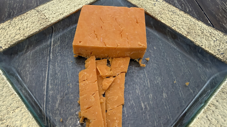 Trader Joe's Ivy's Reserve Somerset Red cheese on gold rimmed plate