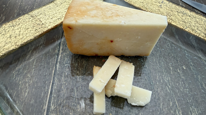 Trader Joe's Toscano Cheese Crunchy Chili Onion on gold rimmed plate