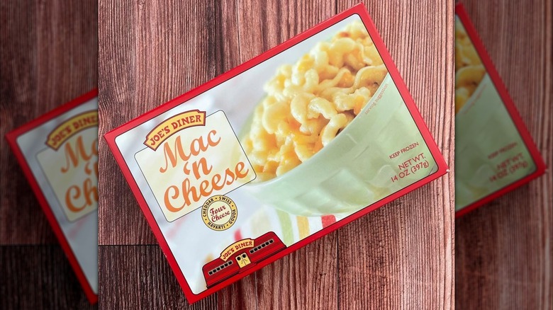 A box of Trader Joe's Diner Mac 'n Cheese on wooden background