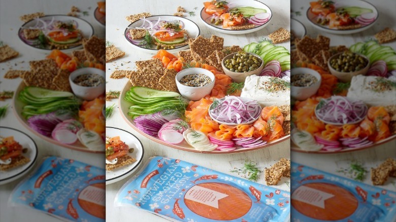 smoked salmon with rye crackers and vegetables