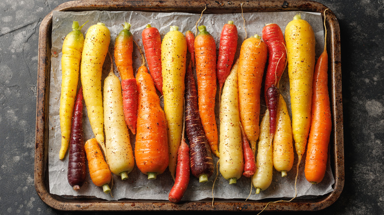 A sheetpan of multicolored carrots