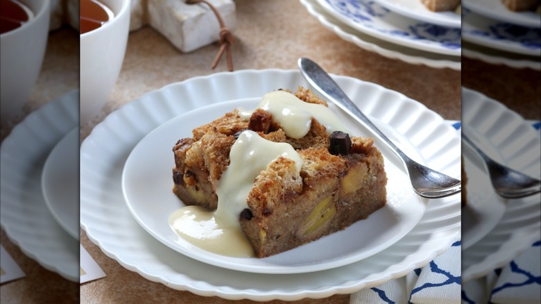 Bread pudding on plate with sauce