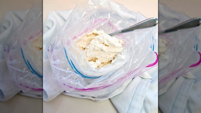 Ice cream in a Ziploc bag with spoon