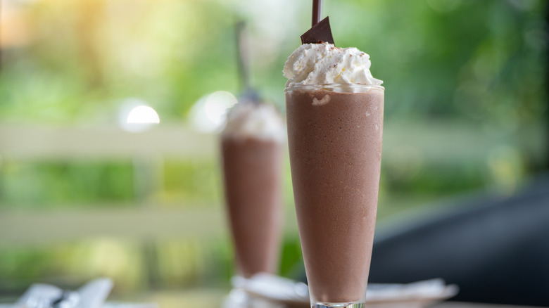 Glass of frozen hot chocolate with whipped cream