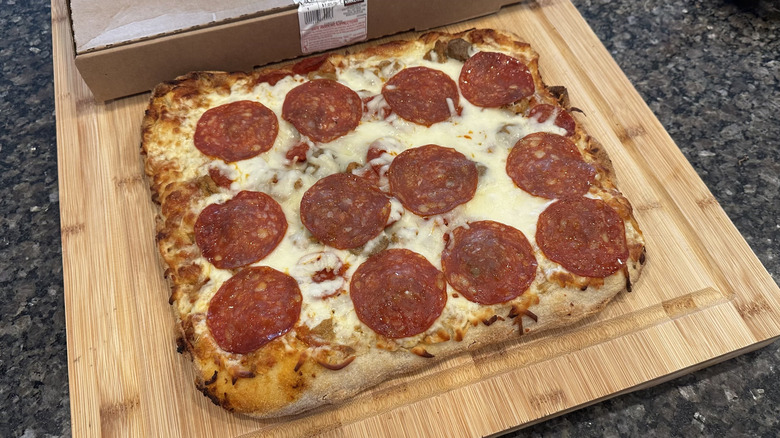 Cooked take and bake pizza