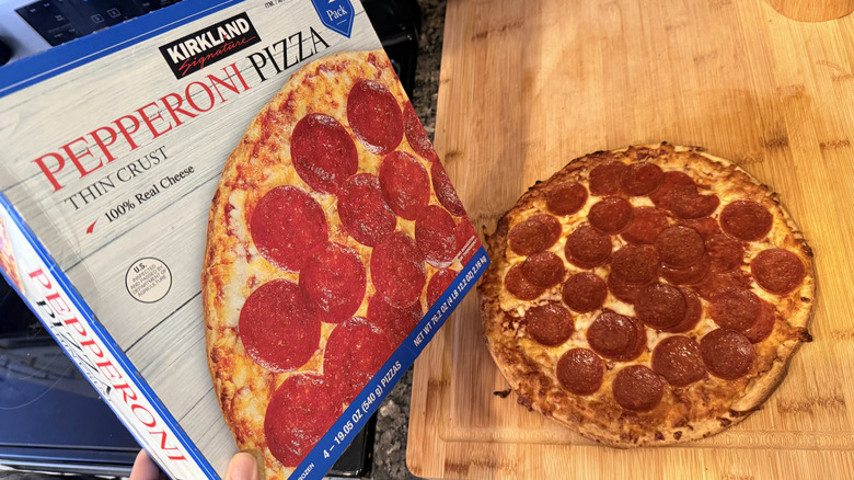Cooked Kirkland pepperoni pizza with box