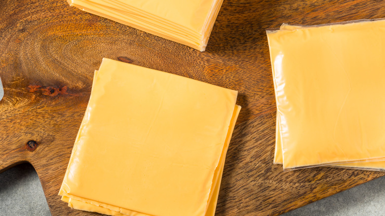 Stacks of American cheese slices