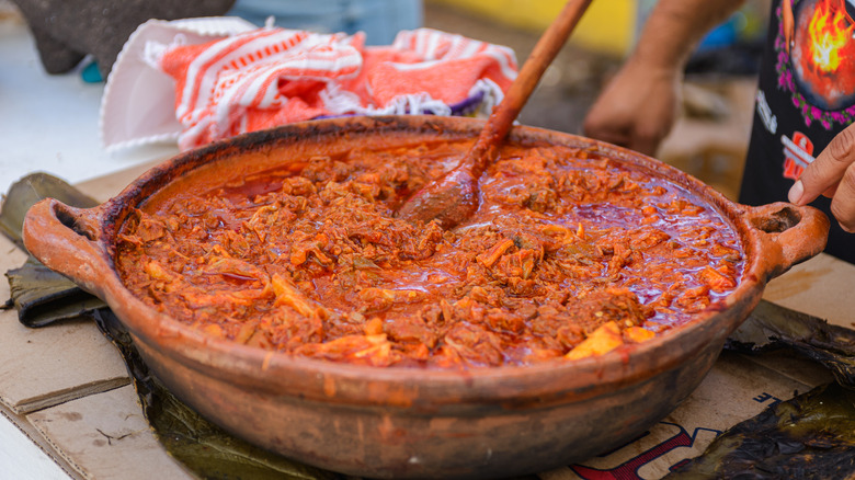Authentic Mexican birria in an earthenware casserole