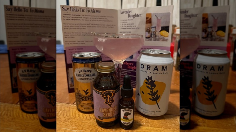 Cocktail, canned drink, bitters, and non-alcoholic spirit from a Raising the Bar Cocktail Kit