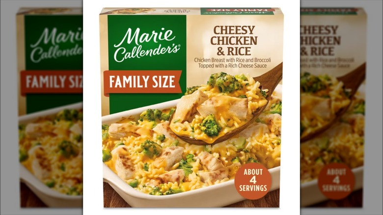 Product image of box of Marie Callender's cheesy chicken and rice on a white background, mirrored
