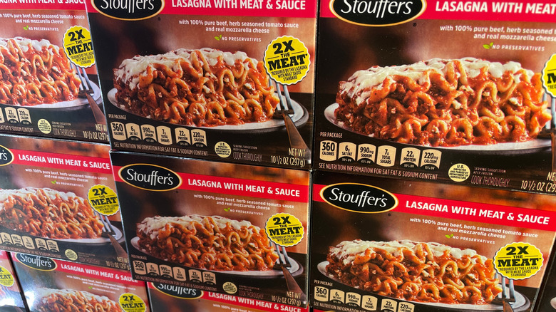 Boxes of Stouffer's lasagna on display in a frozen aisle of a supermarket