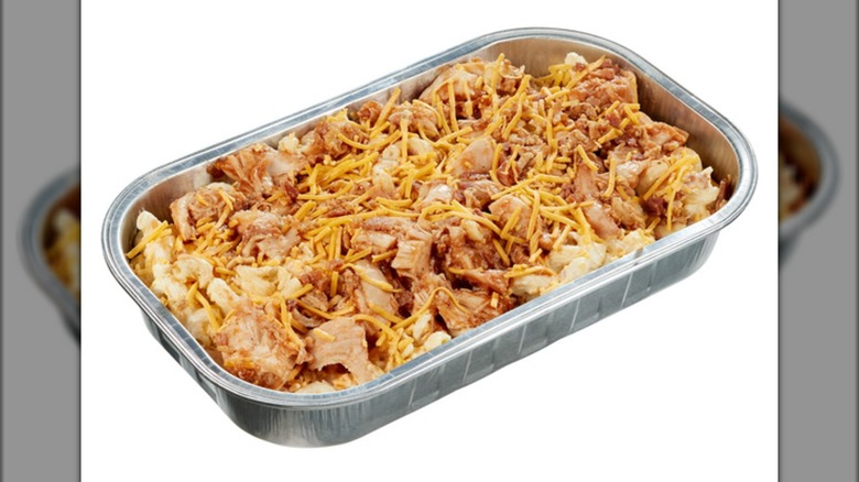 A tray of the Kirkland Signature BBQ Chicken Mac and Cheese with Bacon sold at Costco