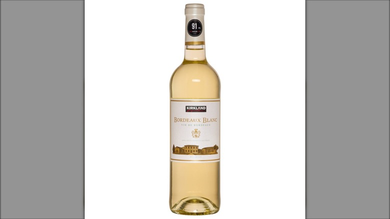 A bottle of the Kirkland Signature Bordeaux Blanc wine sold exclusively at Costco
