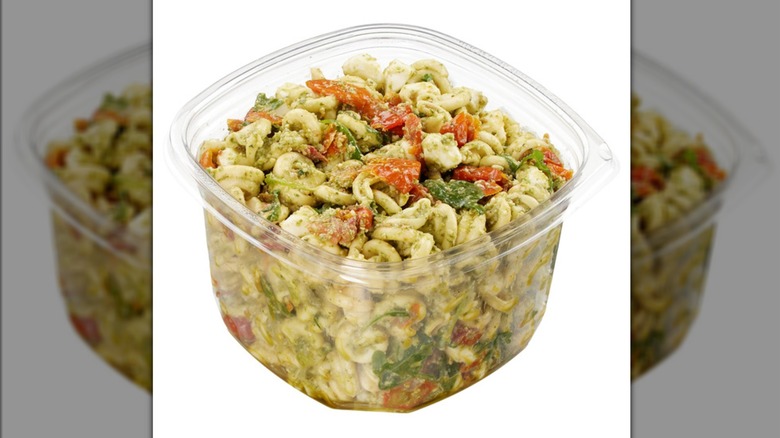 A container of the Kirkland Signature Pesto Pasta Salad from Costco
