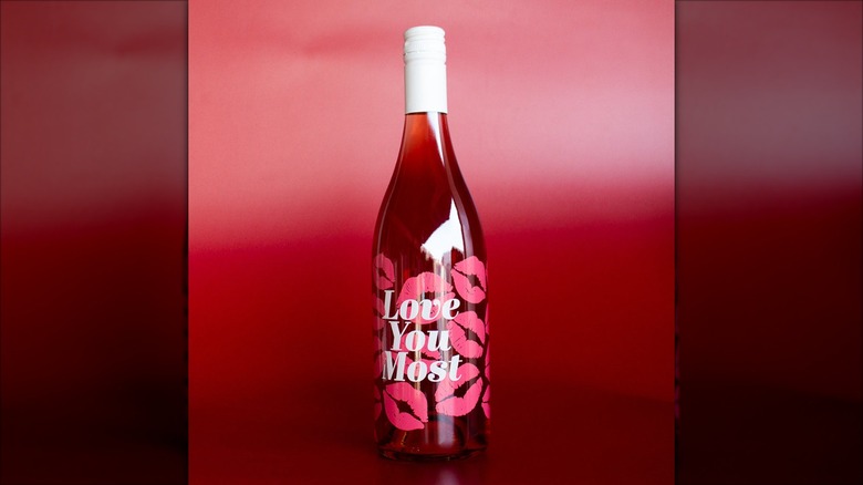 wine bottle decorated with lipstick kisses