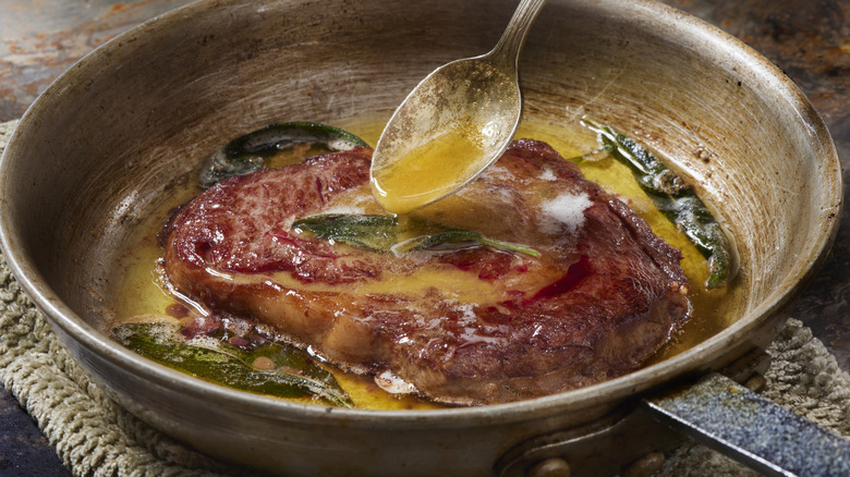 Basting steak with butter