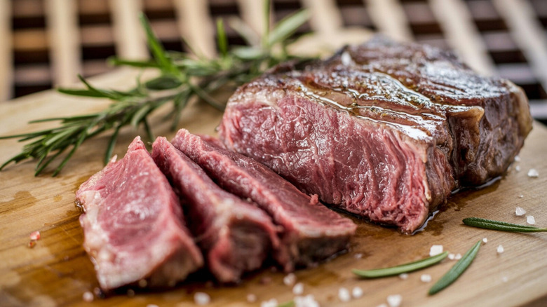 Medium rare steak cut into slices