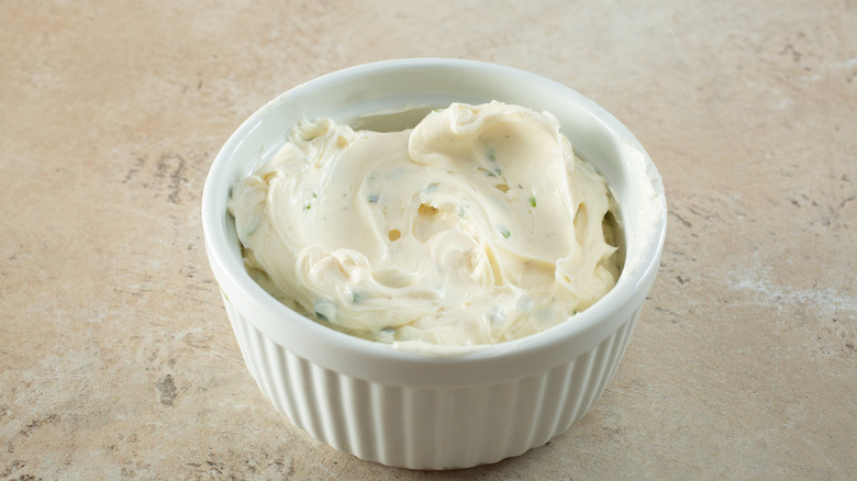 White ramekin of compound butter