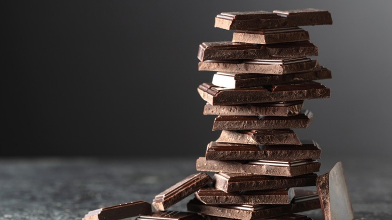 Pieces of stacked dark chocolate.