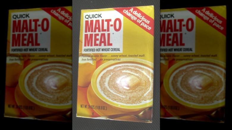 A box of Malt-O-Meal hot cereal; box is yellow with the log in a red box top left; a bowl of hot cereal with milk swirled in it and a pat of butter on the bottom
