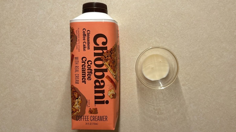 Chobani Cinnamon Coffee Cake Dairy Creamer bottle and creamer in glass ramekin