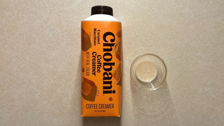 Chobani Caramel Macchiato Dairy Creamer bottle and creamer in glass ramekin